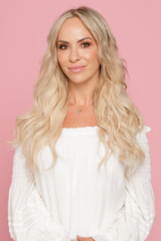 Front view of woman with Isla clip in hair extensions 